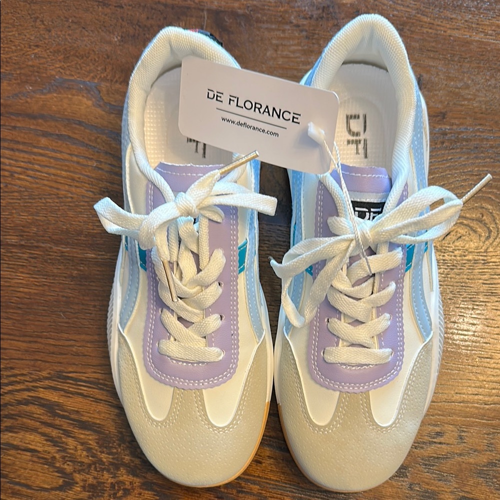 White and Purple Sneakers with Suede Accents and Mesh Design